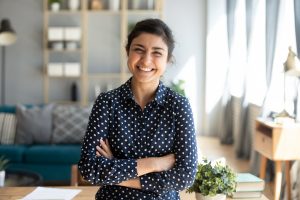 setting intentions-smiling woman with arms crossed